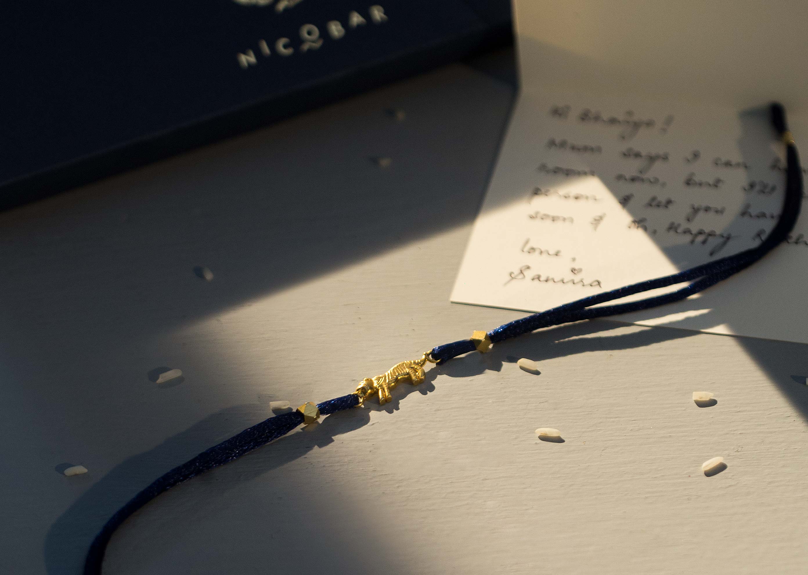 Tiger Rakhi - Gold