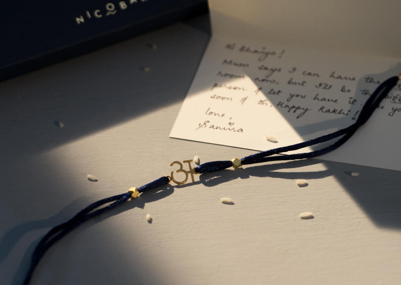 Alphabet A Rakhi - Gold