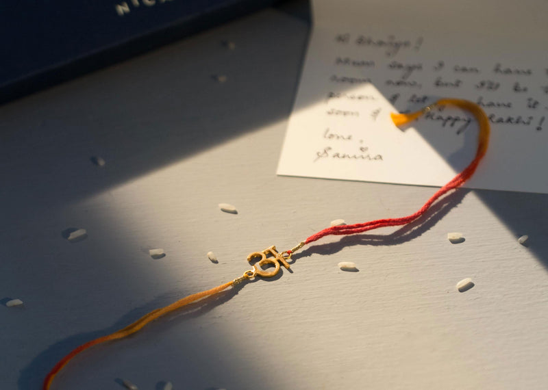 Alphabet A Rakhi - Saffron