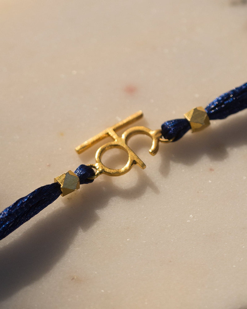 Alphabet K Rakhi - Gold