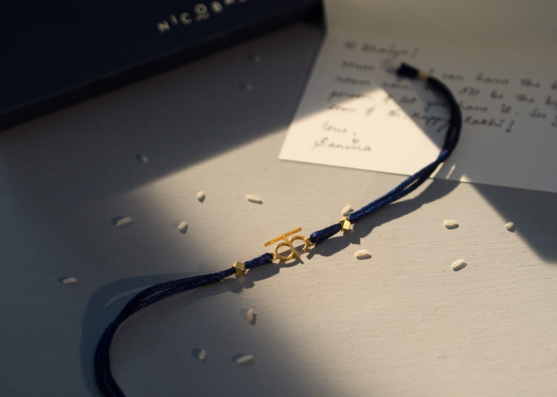Alphabet K Rakhi - Gold