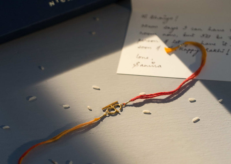 Alphabet K Rakhi - Saffron