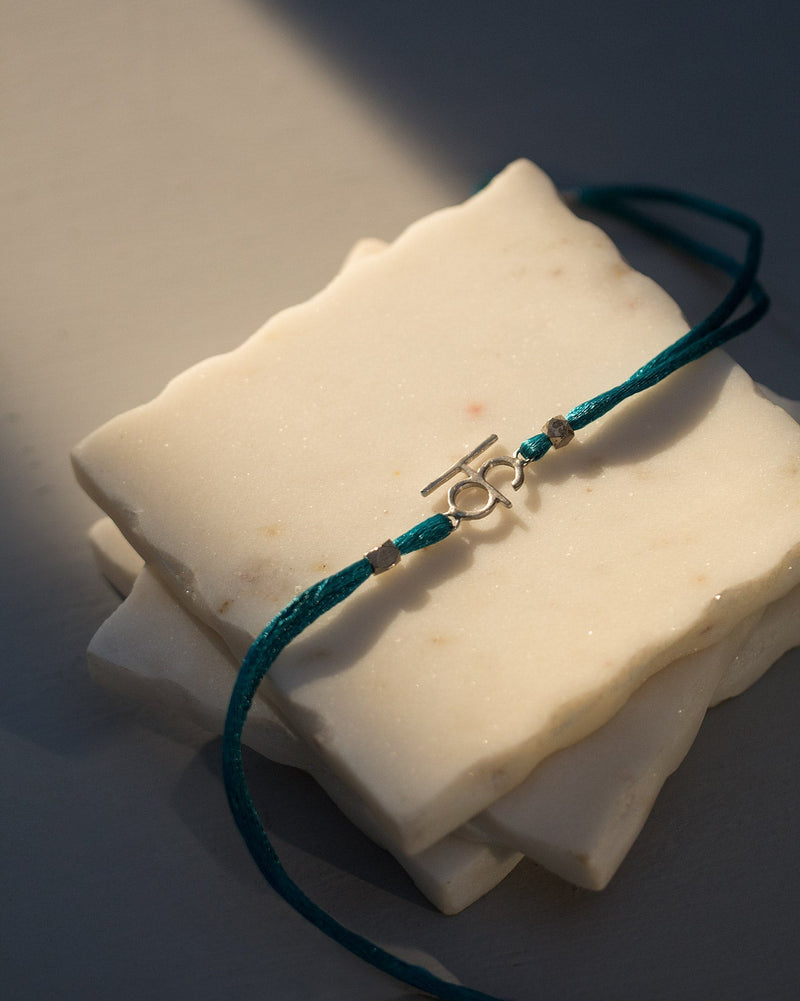 Alphabet K Rakhi - Silver