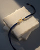 Alphabet M Rakhi - Gold