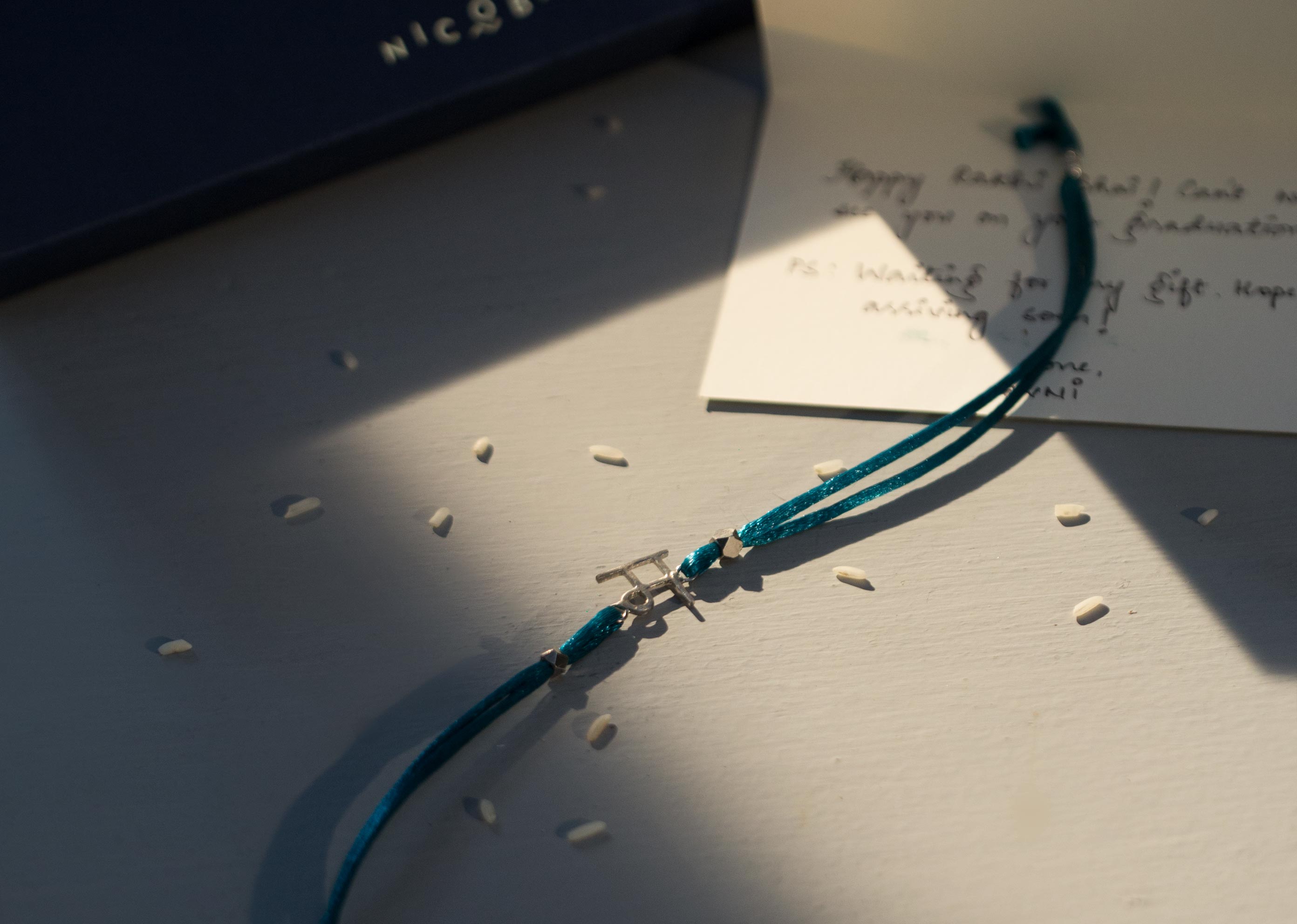 Alphabet M Rakhi - Silver