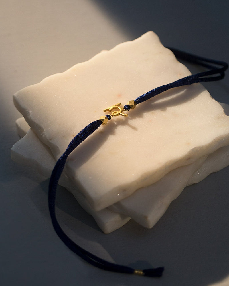 Alphabet R Rakhi - Gold