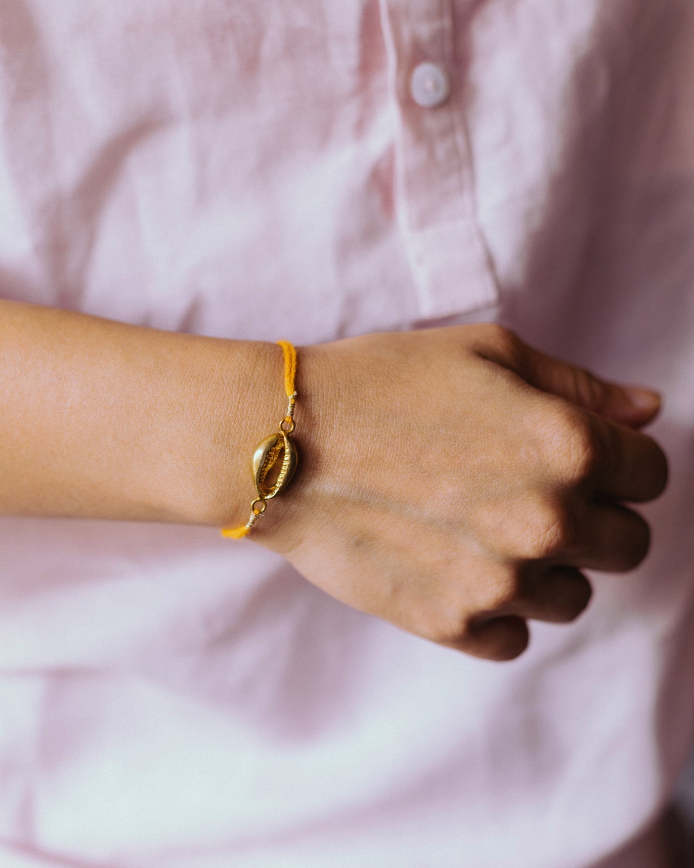 Cowri Rakhi - Saffron