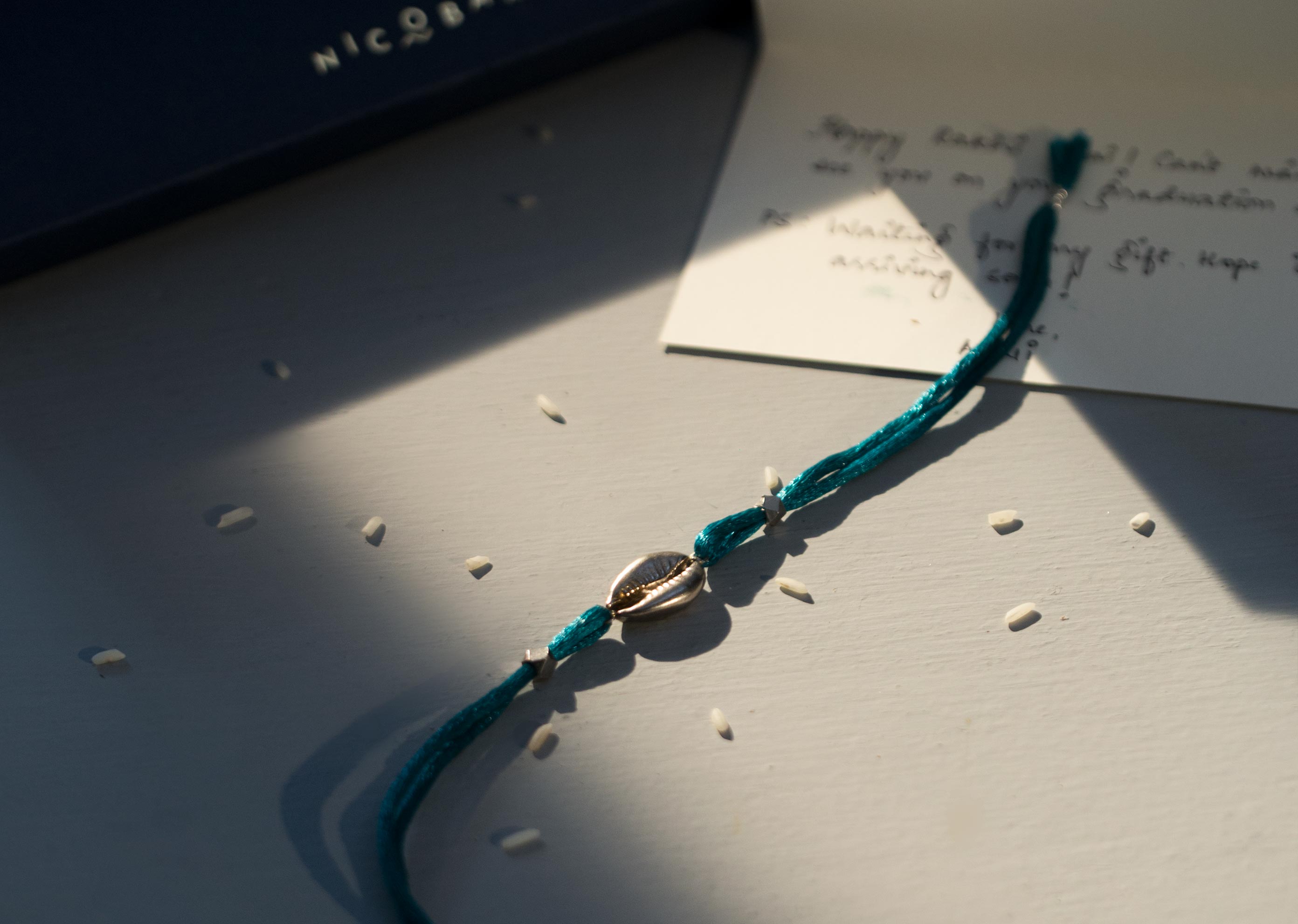Cowri Rakhi - Silver